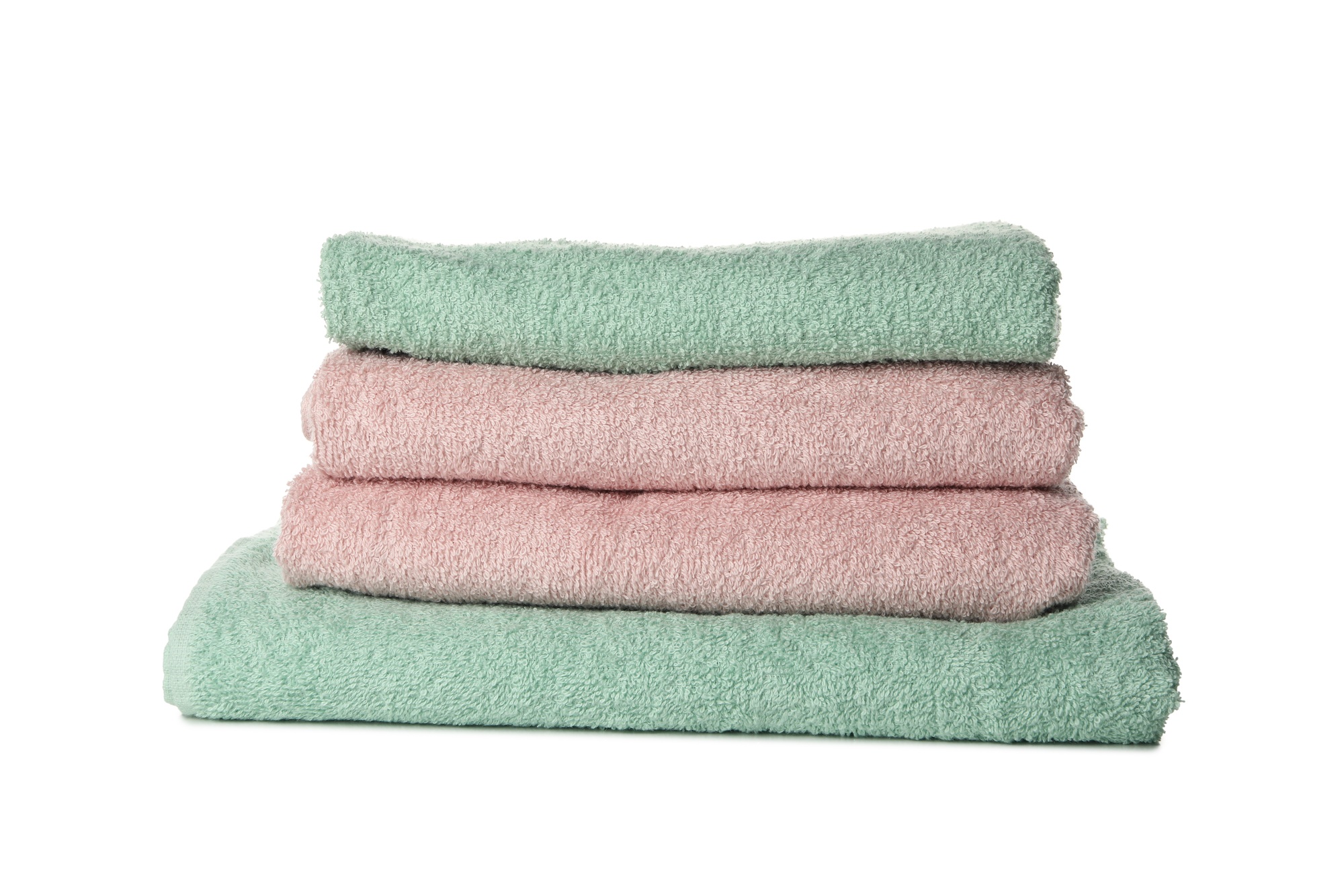 Pile of towels isolated on white background